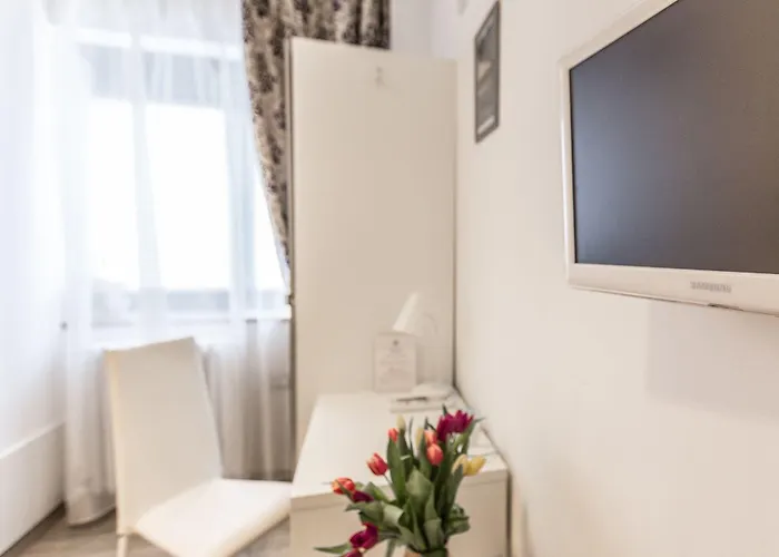 Pensión Central City Rooms 4*